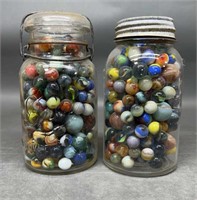 Two Quart Jars Of Marbles