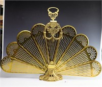 Antique art Deco peacock/fan design brass fireplac