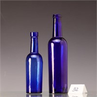 Two vintage cobalt blue bottles