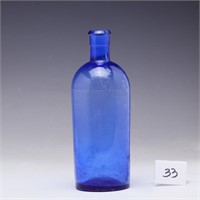 Antique apothecary cobalt blue bottle marked on bo
