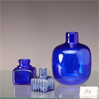Vintage hand blown cobalt blue bottle and two anti