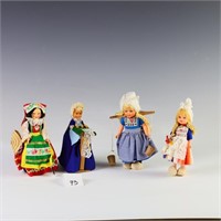 Four foreign vintage dolls