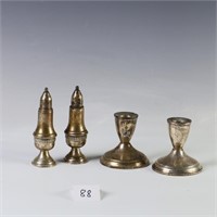 Weighted sterling silver candlesticks and salt and