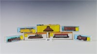Vintage Arnold and Atlas train cars 7 pieces