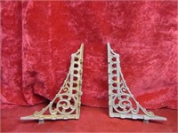 Fancy cast iron  brackets.