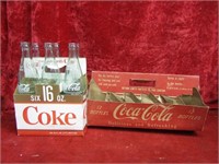 Coca cola bottles & card board carriers