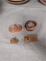 Hand woven jewelry by artists in Muhunga