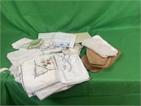 Cloth napkins, wood trivets, table cloth and