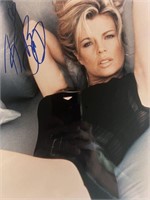 Kim Basinger signed photo. GFA authenticated.
