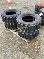E.(4) new 12-16.5 skid steer tires
