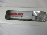 LIONEL TRACTOR & TRAILER TRAINMASTER PUTTING THE