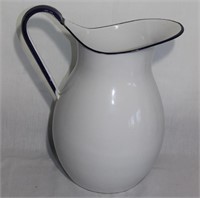 large vintage enamelware pitcher blue handle
