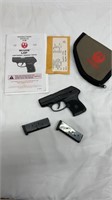 Ruger LCP 380.  Clean gun with everything but the