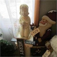 Wooden Santa, signs, praying girl