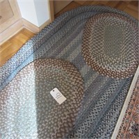 3 oval braided rugs