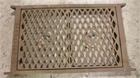 A Buch's & Sons Universal Cast Iron Grate