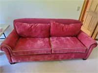red sued sofa