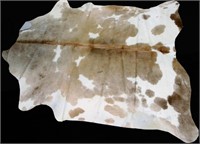 LIGHT BROWN AND WHITE COWHIDE