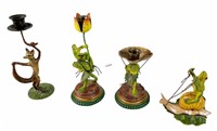 FOUR PETITES CHOSES PAINTED METAL CANDLE HOLDERS