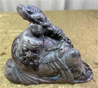 HAND CARVED ORIENTAL FISHERMAN