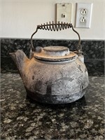 Antique cast-iron tea, kettle