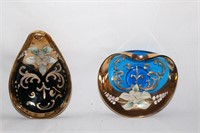 two enamel painted colored glass ashtrays    S