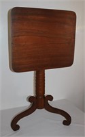 19th century black walnut tilt top table
