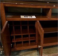 54"L x 36"T wooden wine cabinet - scuffs and nics