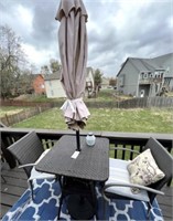 Bar table w/ 2 chairs and weighted umbrella -