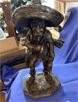 12" Chucho statue - wood base and heavy metal