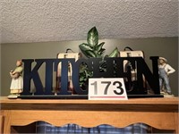 Wooden kitchen sign and 2 figurines, plant and 2