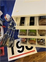 Assortment of kitchen items - spice rack, baskets,