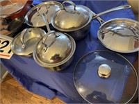 Assortment of pots and pans and lids