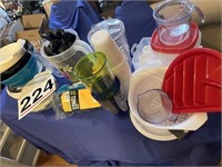 Assortment of plastic containers, cups, pitchers,