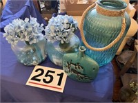4 blue vases