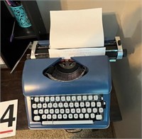 Typewriter and office supplies