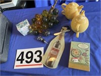 Glass grapes, scrimshaw egg, stacking teapots,