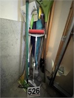Assortment of lawn tools and cleaning mops