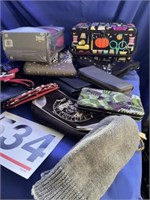 Assortment of purses, pair of boxing gloves,