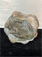 Natural stone carved dinosaur
