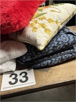 Assortment of 7 pillows - 4 bed and 3 throw