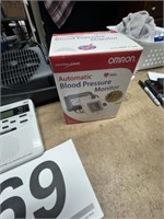Blood pressure monitor, Midland weather radio,