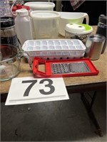 Assortment of storage containers, measuring
