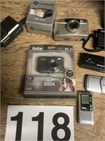 Assortment of cameras, voice recorder, etc