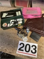 Hot glue gun and sticks, leather purse, heating