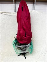 Christmas tree on stand in bag