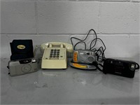 Vintage cameras and telephone
