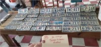 30 vintage Texas license plates.