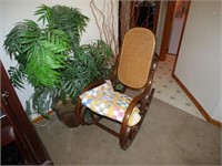 FAKE PLANTS, ROCKING CHAIR & QUILT
