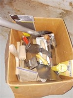 Box full of drywall tools and scrapers